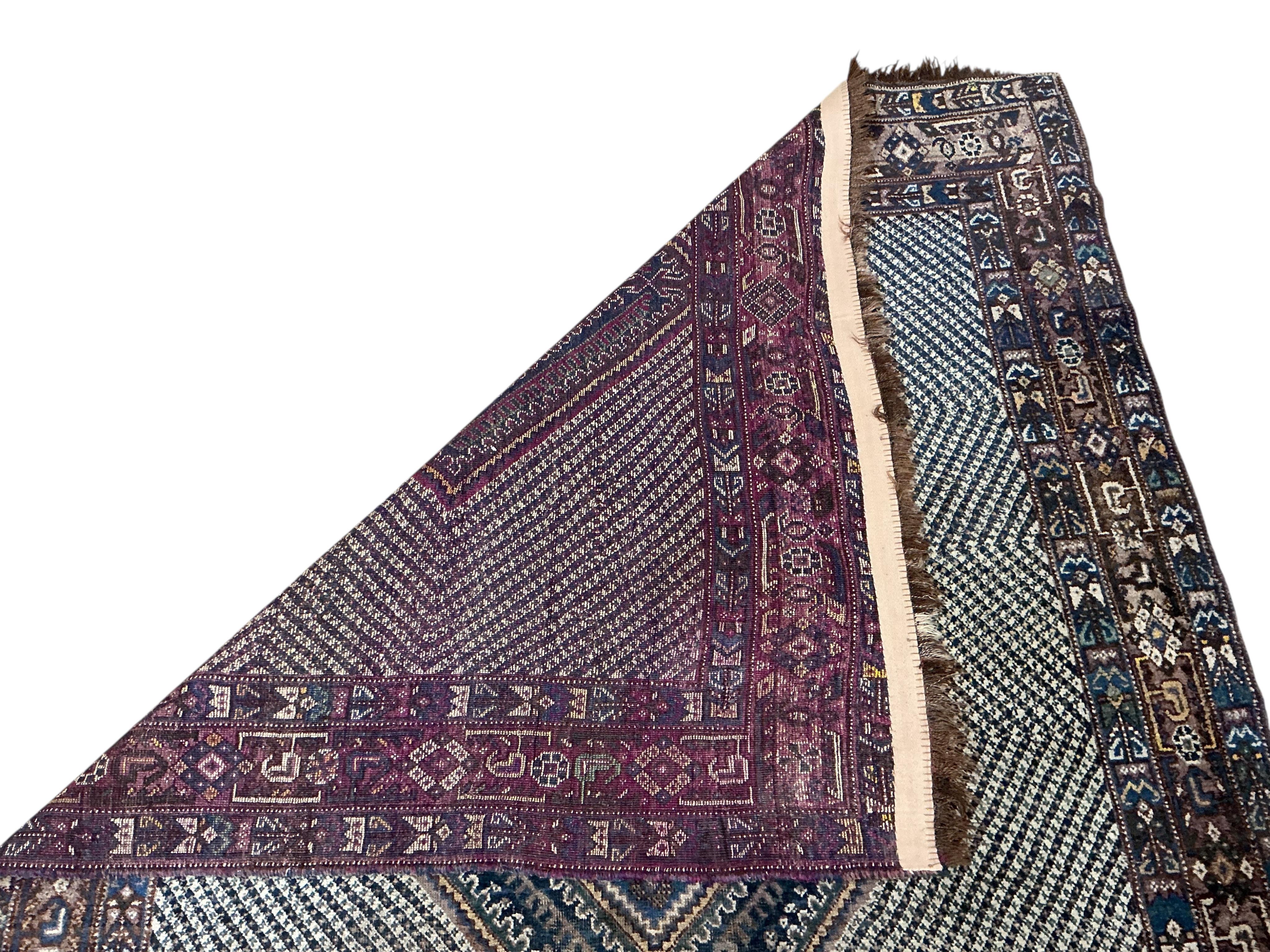 An Afshar blue ground rug, 176 x 130cm